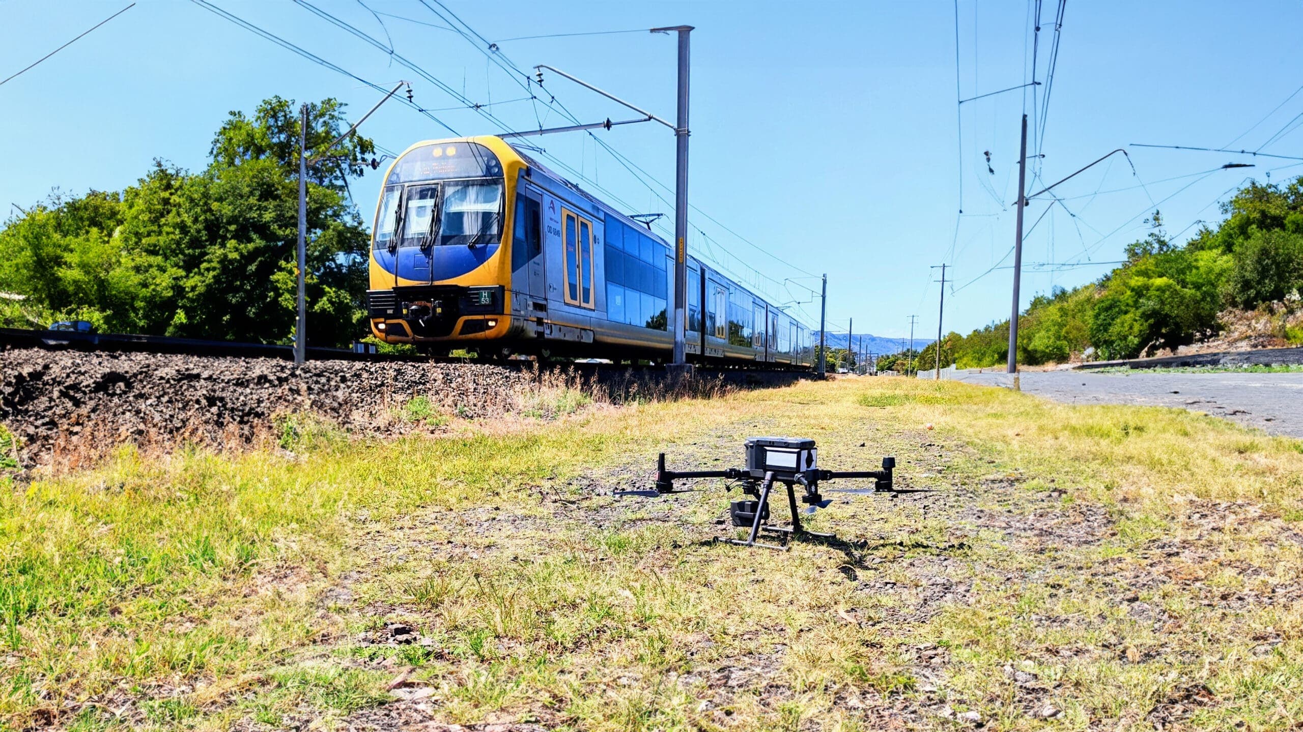 LiDAR drone beside an electrified rail corridor