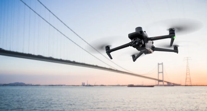 Mavic 3 Enterprise Series aircraft flying beside a suspension bridge.