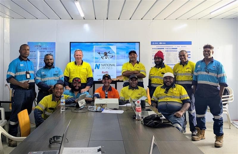 National Drones instructor with a group of RePL trainees in a training room